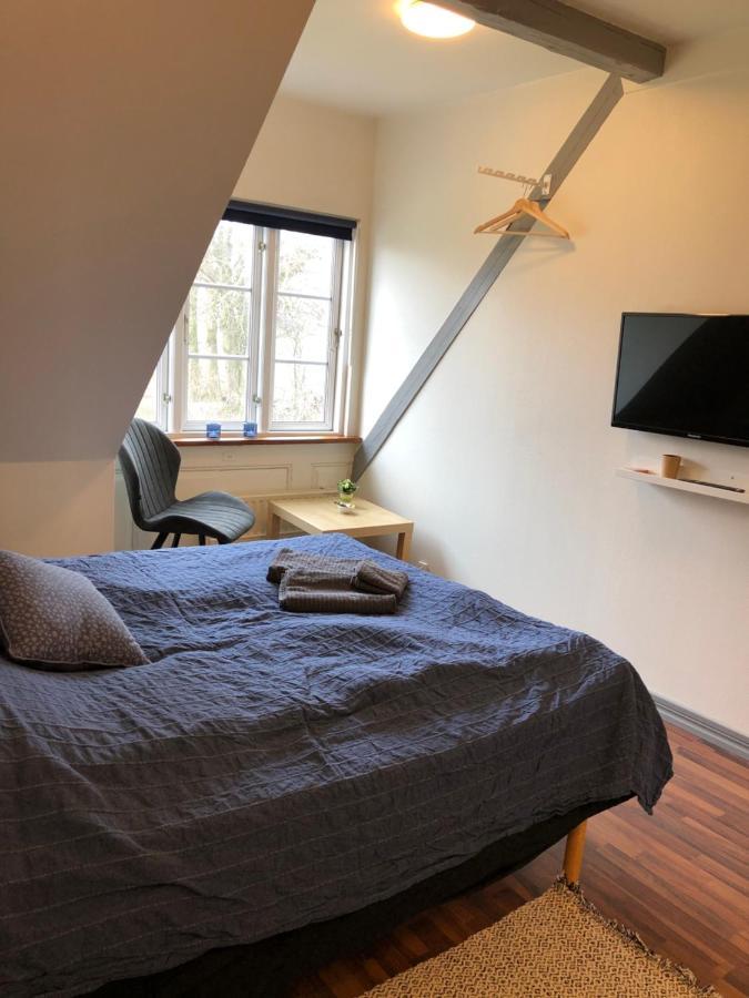 Dobbeltværelse med fælles badeværelse