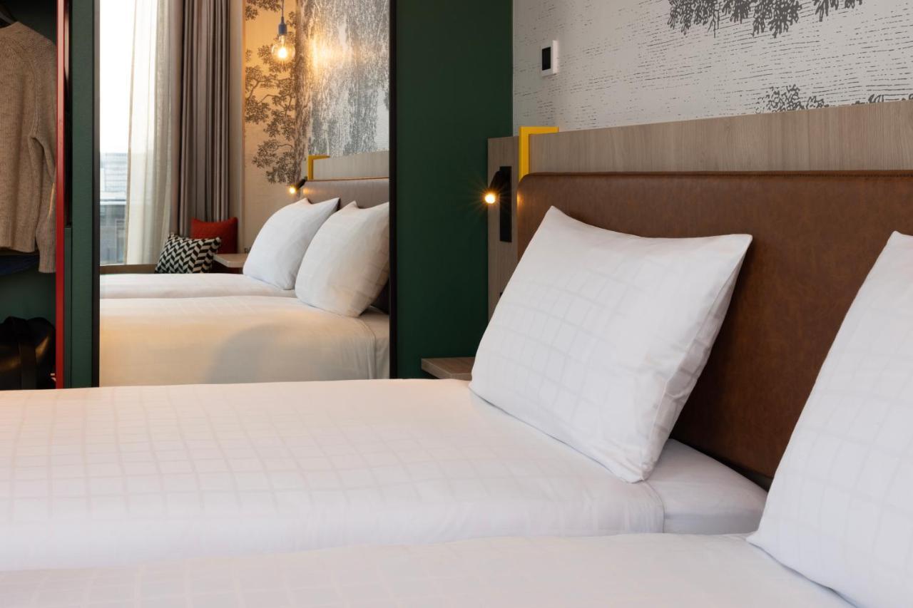 Quarto Deluxe de Canto com 2 Camas de Solteiro