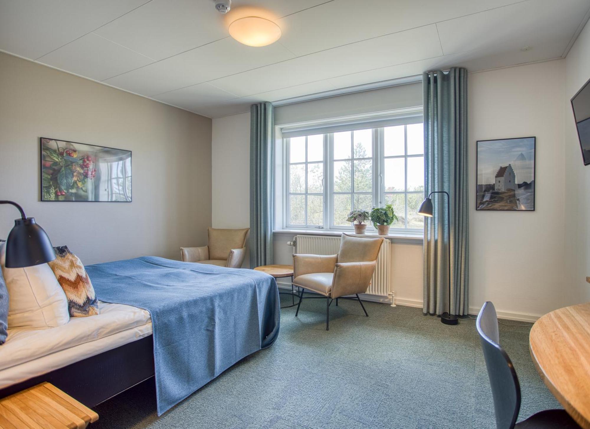 Doppel- oder Zweibettzimmer