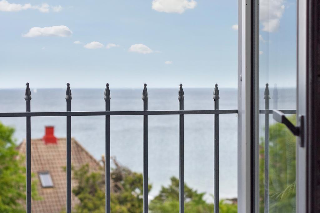 Dobbeltværelse med fransk balkon og havudsigt